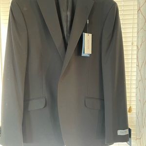 Black blazer 2 button style. NWT-never worn. Will work with price!